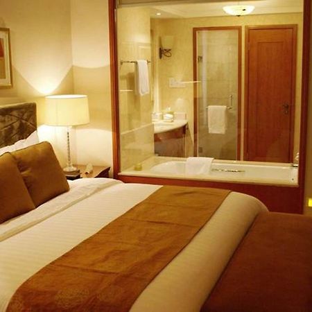 New Century Grand Hotel Kaifeng Bagian luar foto