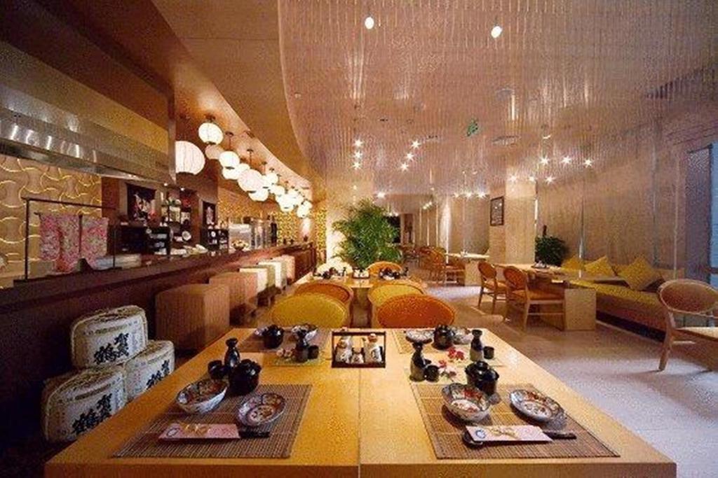 New Century Grand Hotel Kaifeng Bagian luar foto